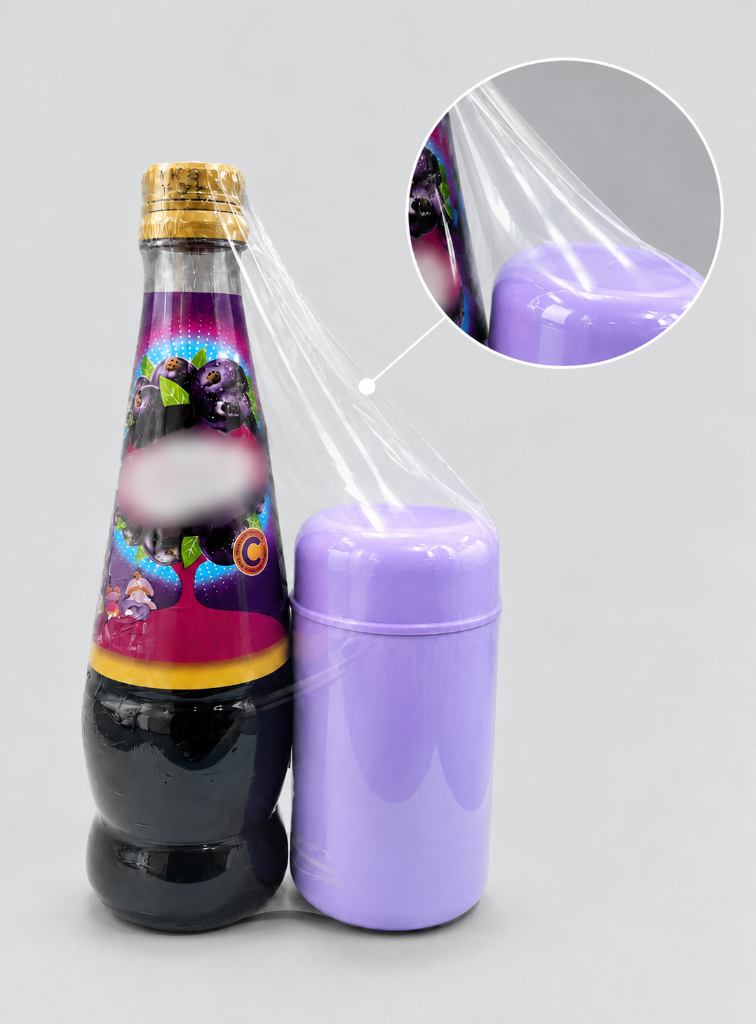 Bottle and container wrapped in PVC shrink film
